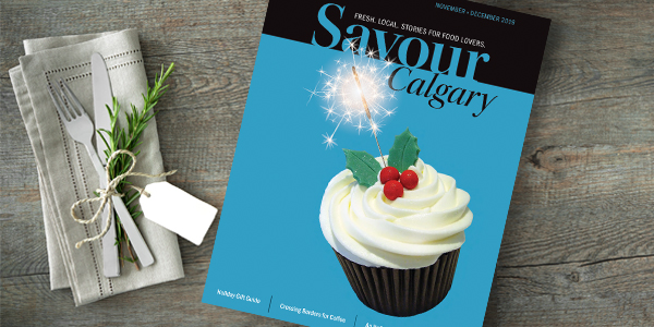 Savour Calgary magazine on a table