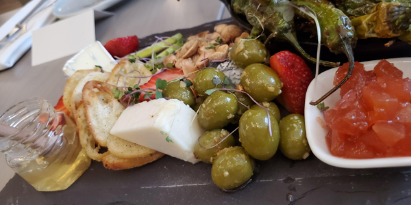 Calgary Bearspaw, Restaurant Flores and Pine charcuterie, platter olives honey peppers cheese