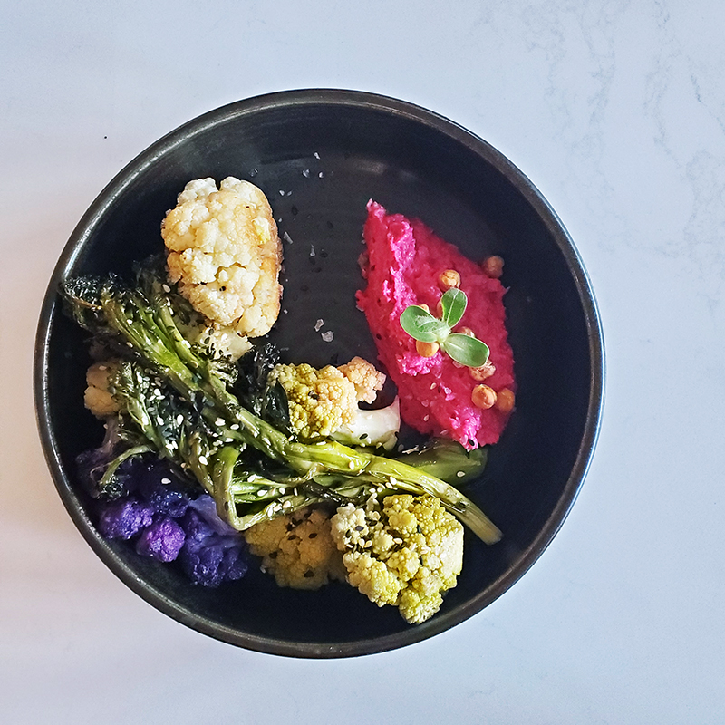 Farm and Fire restaurant Banff brassicas with beet hummus and crispy chickpeas